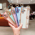16 Case - Luxury Heart Design with Adjustable Wristband, Kickstand & Loop