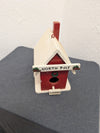 Vintage handcrafted North Pole birdhouse
