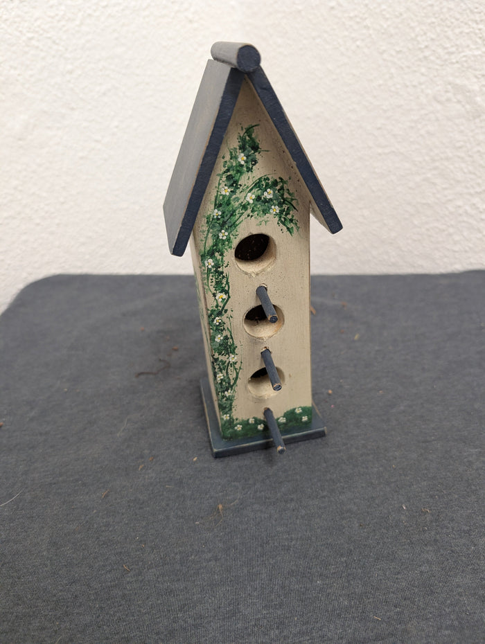 Vintage handcrafted three post tall birdhouse