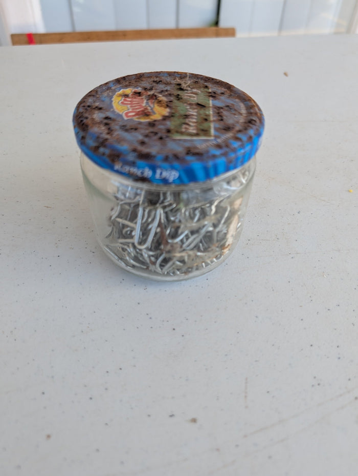 Glass jar - vintage with vintage fencing staples